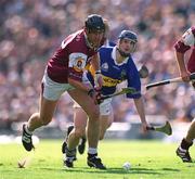 9 September 2001; Joe Rabitte of Galway in action against Paul Kelly of Tipperary during the Guinness All-Ireland Senior Hurling Championship Final match between Tipperary and Galway at Croke Park in Dublin. Photo by Ray McManus/Sportsfile