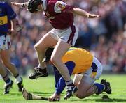 9 September 2001; Tipperary goalkeeper Brendan Cummins grabs the sliothar under pressure from Eugene Cloonan of Galway during the Guinness All-Ireland Senior Hurling Championship Final match between Tipperary and Galway at Croke Park in Dublin. Photo by Ray McManus/Sportsfile