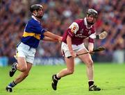 9 September 2001; Liam Hodgins of Galway in action against Thomas Dunne of Tipperary during the Guinness All-Ireland Senior Hurling Championship Final match between Tipperary and Galway at Croke Park in Dublin. Photo by Aoife Rice/Sportsfile