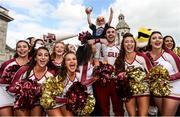 2 September 2016; Ahead of the Aer Lingus College Football Classic tomorrow at the Aviva Stadium, both Boston College and Georgia Tech hosted Pep Rallies in Trinity College Dublin this afternoon. Marching bands, cheerleaders, players and coaches all got involved as the excitement continues to build for tomorrow’s big event. Limited tickets available at the stadium box office tomorrow, see www.collegefootballireland.com. Matthew Rigert, 3, from Boston, poses for a picture with cheerleaders from Boston College during the Pep Rally at Trinity College in Dublin. Photo by Sam Barnes/Sportsfile