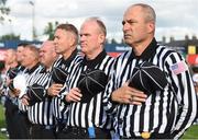 2 September 2016; Referees during the national anthems of both Ireland and USA ahead of the game between Marist School and Belen Jesuit. Donnybrook Stadium hosted a triple-header of high school American football games today as part of the Aer Lingus College Football Classic. Six top high school teams took part in the American Football Showcase with all proceeds from the game going to Special Olympics Ireland, the official charity partner to the Aer Lingus College Football Classic. High School American Football Showcase between Marist School of Atlanta, Georgia and Belen Jesuit of Miami, Florida at Donnybrook Stadium in Dublin. Photo by Cody Glenn/Sportsfile