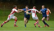 3 September 2016; Sean O'Brien of Leinster is tackled by James Hume and Mark Keane of Ulster during the U19 Interprovincial Series Round 1 match between Ulster and Leinster at RBAI in Belfast. Photo by Oliver McVeigh/Sportsfile
