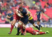 3 September 2016; Dave Foley of Munster is tackled by Hadleigh Parkes of Scarlets during the Guinness PRO12 Round 1 match between Scarlets and Munster at Parc Y Scarlets in Llanelli, Wales. Photo by Huw Evans/Sportsfile
