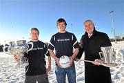 8 December 2010; Uachtarán Chumann Lúthchleas Gael Criostóir Ó Cuana, with UCD players Tommy Warburton, left, and John Heslin, pictured today at the 2010 Higher Education Championship Draws in University College Dublin. Dublin City University and NUI Galway will defend their respective Ulster Bank Sigerson and Fitzgibbon Cup crowns in the highly anticipated 2011 Championships. Ulster Bank Higher Education Championship Draws, University College Dublin, Belfield, Dublin. Picture credit: David Maher / SPORTSFILE