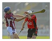 10 October 2010; Diarmuid Lyng, St Martin's, breaks his hurley across the left arm of his opponent Des Mythen, Oulart the Ballagh, during the game. Wexford County Senior Hurling Championship Final, Oulart the Ballagh v St Martin's, Wexford Park, Wexford. Picture credit: Matt Browne / SPORTSFILE