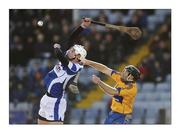 28 February 2010; Chops and drops. Neil Foyle of Laois is ahead of Clare’s Pat Vaughan to greet the ball as it arrives in Portlaoise. Picture credit: Pat Murphy / SPORTSFILE