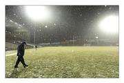 20 February 2010; The snow has performed its noiseless work. Kilkenny’s National League game with Tipperary is postponed. Brian Cody walks the pitch searching for omens perhaps. Picture credit: Brendan Moran / SPORTSFILE