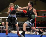 10 December 2010; Christina McMahon, right, in action against Polina Teucheva, during their Bantamweight title bout. Dolphil Promotions Fight Night - The Prides Path to Glory - Undercard, National Basketball Arena, Tallaght, Dublin. Picture credit: David Maher / SPORTSFILE