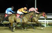 10 December 2010; Dash Back, no.10, with Shane Foley up, on the way to winning The www.dundalkstadium.com Handicap. Horse racing, Dundalk Racecourse, Dundalk, Co. Louth. Photo by Sportsfile