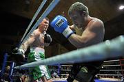 10 December 2010; Paddy McDonagh, left, in action against Martins Dolgovs, during their Light Heavyweight title bout. Dolphil Promotions Fight Night - The Prides Path to Glory - Undercard, National Basketball Arena, Tallaght, Dublin. Picture credit: David Maher / SPORTSFILE