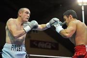 10 December 2010; Anthony 'The Pride' Fitzgerald, left, in action against Keith Hammond. WBF Intercontinental Title Fight, Anthony 'The Pride' Fitzgerald v Keith Hammond, National Basketball Arena, Tallaght, Dublin. Picture credit: David Maher / SPORTSFILE