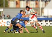 11 December 2010; Pedrie Wannenburg, Ulster Rugby, is tackled by Olly Barkley, Bath Rugby. Heineken Cup Pool 4, Round 3, Ulster Rugby v Bath Rugby, Ravenhill Park, Belfast. Picture credit: Oliver McVeigh / SPORTSFILE