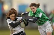 11 December 2010; Emma Collins, St Enda’s, Tyrone, in action against Ciara Kilroy, Caltra Cuans, Galway. Tesco All-Ireland Junior Ladies Football Club Championship Final, Caltra Cuans, Galway v St Enda’s, Tyrone, Mullahoran, Cavan. Photo by Sportsfile