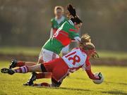 12 December 2010; Amy O'Shea, Inch Rovers, Cork, in action against Caroline McGing, Carnacon, Mayo. Tesco All-Ireland Senior Ladies Football Club Championship Final, Carnacon, Mayo v Inch Rovers, Cork, Leahy Park, Cashel, Tipperary. Picture credit: David Maher / SPORTSFILE