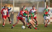 12 December 2010; Jenny Duffy, Inch Rovers, Cork, in action against Cora Staunton, Carnacon, Mayo. Tesco All-Ireland Senior Ladies Football Club Championship Final, Carnacon, Mayo v Inch Rovers, Cork, Leahy Park, Cashel, Tipperary. Picture credit: David Maher / SPORTSFILE