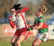 12 December 2010; Annie Walsh, Inch Rovers, Cork, in action against Claire Egan, Carnacon, Mayo. Tesco All-Ireland Senior Ladies Football Club Championship Final, Carnacon, Mayo v Inch Rovers, Cork, Leahy Park, Cashel, Tipperary. Picture credit: David Maher / SPORTSFILE