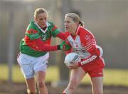 12 December 2010; Mary O'Connor, Inch Rovers, Cork, in action against Sharon McGing, Carnacon, Mayo. Tesco All-Ireland Senior Ladies Football Club Championship Final, Carnacon, Mayo v Inch Rovers, Cork, Leahy Park, Cashel, Tipperary. Picture credit: David Maher / SPORTSFILE