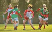 12 December 2010; Annie Walsh, Inch Rovers, Cork, in action against Michelle McGing, left, and Fiona McHale, Carnacon, Mayo. Tesco All-Ireland Senior Ladies Football Club Championship Final, Carnacon, Mayo v Inch Rovers, Cork, Leahy Park, Cashel, Tipperary. Picture credit: David Maher / SPORTSFILE