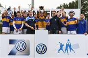 3 September 2016; Robert Emmetts GAA Club, London, captain Paudge Buckley lifts the cup after winning the Shield final against Tramore GAA Club, Co. Waterford at the Volkswagen St Judes Junior Hurling Sevens, at St. Jude's GAA Club, Wellington Lane in Templeogue, Dublin. Photo by Matt Browne/Sportsfile