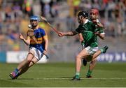 4 September 2016; Jake Morris of Tipperary in action against Ciarán O Connor and Finn Hourigan, right, of Limerick during the Electric Ireland GAA Hurling All-Ireland Minor Championship Final in Croke Park, Dublin.  Photo by Piaras Ó Mídheach/Sportsfile