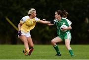 4 September 2016; Helen Hughes of London in action against Áine Tubridy of Antrim during the TG4 All Ireland Junior Football Championship Semi Final between Antrim and London in Fingallians, Dublin.  Photo by Sam Barnes/Sportsfile