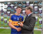 4 September 2016; Colin English of Tipperary is presented with the Electric Ireland man of the match award by Pat O'Doherty, Chief Executive of ESB, following the Electric Ireland GAA Hurling All-Ireland Minor Championship Final in Croke Park, Dublin. Photo by Ray McManus/Sportsfile