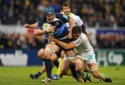 12 December 2010; Sean O'Brien, Leinster, is tackled by Julien Malzieu, ASM Clermont Auvergne. Heineken Cup Pool 2 - Round 3, ASM Clermont Auvergne v Leinster, Stade Marcel Michelin, Clermont, France. Picture credit: Stephen McCarthy / SPORTSFILE