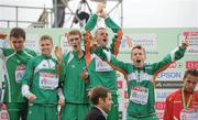 12 December 2010; The Ireland U23 men's team, from left, John Coghlan, David Rooney, Michale Mulhare, David McCarthy and Brendan O'Neill step onto the podium to receive their team gold medals. 17th SPAR European Cross Country Championships, Albufeira, Portugal. Picture credit: Brendan Moran / SPORTSFILE