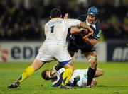 12 December 2010; Sean O'Brien, Leinster, is tackled by Thomas Domingo, 1, and Brock James, ASM Clermont Auvergne. Heineken Cup Pool 2 - Round 3, ASM Clermont Auvergne v Leinster, Stade Marcel Michelin, Clermont, France. Picture credit: Stephen McCarthy / SPORTSFILE