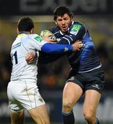 12 December 2010; Shane Horgan, Leinster, is tackled by Julien Malzieu, ASM Clermont Auvergne. Heineken Cup Pool 2 - Round 3, ASM Clermont Auvergne v Leinster, Stade Marcel Michelin, Clermont, France. Picture credit: Stephen McCarthy / SPORTSFILE