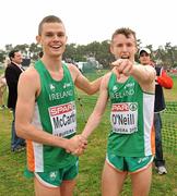 12 December 2010; The Ireland U23 men's team athletes David McCarthy, left, and Brendan O'Neill celebrate after winning the team gold. Ciaran O Lionaird missed the presentation of medals as he was with medical personnel. 17th SPAR European Cross Country Championships, Albufeira, Portugal. Picture credit: Brendan Moran / SPORTSFILE