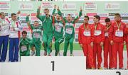12 December 2010; The Ireland U23 men's team, from left, John Coghlan, David Rooney, Michael Mulhare, David McCarthy and Brendan O'Neill step on to the podium to receive their team gold medals. 17th SPAR European Cross Country Championships, Albufeira, Portugal. Picture credit: Brendan Moran / SPORTSFILE