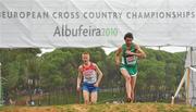 12 December 2010; Ireland's Joe Sweeney competes against Aleksey Reunkov of Russia, on his way to finishing 21st in the Men's Senior race with a time of 29:51. 17th SPAR European Cross Country Championships, Albufeira, Portugal. Picture credit: Brendan Moran / SPORTSFILE