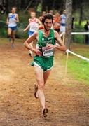 12 December 2010; Ireland's Joe Sweeney holds his side on his way to finishing 21st in the Men's Senior race with a time of 29:51. 17th SPAR European Cross Country Championships, Albufeira, Portugal. Picture credit: Brendan Moran / SPORTSFILE