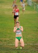 12 December 2010; Portugal's Jessica Augusto falls to her knees after winning the Senior Women's race with a time of 26:52. 17th SPAR European Cross Country Championships, Albufeira, Portugal. Picture credit: Brendan Moran / SPORTSFILE