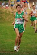 12 December 2010; Ireland's Emmet Jennings runs along with one running shoe on his way to finishing in 42nd place in the Men's Junior race with at time of 19:07. 17th SPAR European Cross Country Championships, Albufeira, Portugal. Picture credit: Brendan Moran / SPORTSFILE