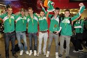 13 December 2010; Members of the Ireland's Men's U-23 gold medal winning AAI team, from left, David McCarthy, John Coughlan, Michael Mulhare, Brendan O'Neill, Ciaran O Lionaird and David Rooney, on their return from the 17th SPAR European Cross Country Championships held in Albufeira, Portugal. Dublin Airport, Dublin. Photo by Sportsfile