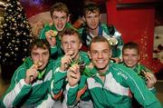 13 December 2010; Members of the Ireland's Men's U-23 gold medal winning AAI team, front row from left, John Coughlan, Brendan O'Neill, David McCarthy and David Rooney, and back row, Michael Mulhare, left, and Ciaran O Lionaird, on their return from the 17th SPAR European Cross Country Championships held in Albufeira, Portugal. Dublin Airport, Dublin. Photo by Sportsfile