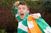 13 December 2010; Ireland Men's U-23 gold medal winning AAI team member Brendan O'Neill celebrates with his gold medal on the team's return from the 17th SPAR European Cross Country Championships held in Albufeira, Portugal. Dublin Airport, Dublin. Photo by Sportsfile