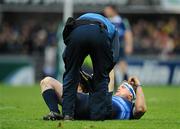 12 December 2010; Jamie Heaslip, Leinster, is treated for an injury during the first half. Heineken Cup Pool 2 - Round 3, ASM Clermont Auvergne v Leinster, Stade Marcel Michelin, Clermont, France. Picture credit: Stephen McCarthy / SPORTSFILE
