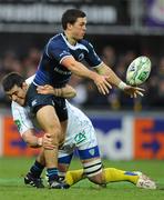 12 December 2010; Eoin O'Malley, Leinster, in action against Loic Jacquet, ASM Clermont Auvergne. Heineken Cup Pool 2 - Round 3, ASM Clermont Auvergne v Leinster, Stade Marcel Michelin, Clermont, France. Picture credit: Stephen McCarthy / SPORTSFILE