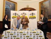 13 December 2010; Future FIFA vice-president Jim Boyce and Chairman of the Setanta organising committee Milo Corcoran perform the draw at the launch of the Setanta Sports Cup for 2011. Belfast City Hall, Donegall Square, Belfast, Co. Antrim. Picture credit: Oliver McVeigh / SPORTSFILE