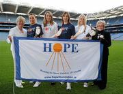 14 December 2010; Leading camogie stars and broadcasting personalities are uniting behind the efforts of an Irish charity, The Hope Foundation, to raise funds for the street and slum children of Calcutta. The partnership 'Camogie for Hope' will work to raise awareness of the work carried out by the charity and liaise on select fundraising initiatives including a charity 'All Stars' camogie match. Furthermore a fundraising run in Calcutta, the 'Kolkatta 10k' is taking place in the Indian city in March, with further information available on www.hopefoundation.ie . Pictured at the launch are, from left, Joan O'Flynn, President of the Camogie Association, Aislinn Connolly, Galway, Evanne Ni Chuillin, RTE, Elaine Alyward, Kilkenny, Jacqui Hurley, RTE, and Maureen Forrest, CEO of The Hope Foundation. Camogie Association & The Hope Foundation Photocall, Croke Park, Dublin. Picture credit: Brian Lawless / SPORTSFILE