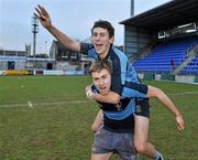 15 December 2010; Newpark Comprehensive captain Fergus Halpin, bottom, with team-mate Sam Crowe celebrates at the end of the game after winning the McMullen Cup. McMullen Cup Final, Skerries C.C. v Newpark Comprehensive, Donnybrook, Dublin. Picture credit: David Maher / SPORTSFILE