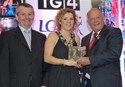 15 December 2010; TG4 celebrated their tenth year as sponsor of the Ladies Football Championships last night at a Banquet in Croke Park and in honour of the association between TG4 and Ladies Football, the TG4 Ladies Football Team of the Decade was announced. Receiving her award as a member of the team from Pat Quill, right, President, Cumann Peil Gael na mBan and Pol O Gallchoir, Ceannasai, TG4, is Valerie Mulcahy of Cork. TG4 Ladies Football Team of the Decade Banquet, Croke Park, Dublin. Picture credit: Brendan Moran / SPORTSFILE