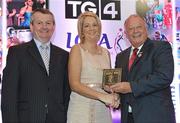 15 December 2010; TG4 celebrated their tenth year as sponsor of the Ladies Football Championships last night at a Banquet in Croke Park and in honour of the association between TG4 and Ladies Football, the TG4 Ladies Football Team of the Decade was announced. Receiving the award  on behalf of Cora Staunton of Mayo as a member of the team from Pat Quill, right, President, Cumann Peil Gael na mBan and Pol O Gallchoir, Ceannasai, TG4, is Caroline Brogan, Chairperson of the Mayo County Board. TG4 Ladies Football Team of the Decade Banquet, Croke Park, Dublin. Picture credit: Brendan Moran / SPORTSFILE