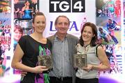 15 December 2010; TG4 celebrated their tenth year as sponsor of the Ladies Football Championships last night at a Banquet in Croke Park and in honour of the association between TG4 and Ladies Football, the TG4 Ladies Football Team of the Decade was announced. Pictured are the Waterford players honoured, Mary O'Donnell, left, and Rebecca Hallahan with former Waterford team manager Michael Ryan. TG4 Ladies Football Team of the Decade Banquet, Croke Park, Dublin. Picture credit: Brendan Moran / SPORTSFILE