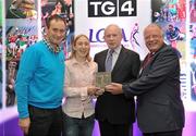 15 December 2010; TG4 celebrated their tenth year as sponsor of the Ladies Football Championships last night at a Banquet in Croke Park and in honour of the association between TG4 and Ladies Football, the TG4 Ladies Football Team of the Decade was announced. Pictured is the only Kerry player honoured Geraldine O'Shea, with, from left, Robbie Griffin, Mick Fitzgerald and Pat Quill, President, Cumann peil Gael na mBan. TG4 Ladies Football Team of the Decade Banquet, Croke Park, Dublin. Picture credit: Brendan Moran / SPORTSFILE