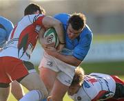 11 December 2010; Aaron Dundon, Leinster, is tackled by Johnny Coleman and Kieran Hallett, Plymouth Albion. British & Irish Cup, Leinster v Plymouth Albion, Dr. Hickey Park, Greystones RFC, Co. Wicklow. Picture credit: Matt Browne / SPORTSFILE