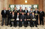 16 December 2010; Former Republic of Ireland international Ray Houghton, centre front row, with members of the Tullamore Town FC, Special Olympics Ireland team. Back row, left to right, Leslie Francis, team coach, Peter McCormack, Keith Murray, Paul Byrne, Nicholas Minnock, David Matthews, Patrick Moore and Joe Connolly, team coach. Front row, left to right, Jonathan Fitzpatrick, Alan Lonergan, Desmond Gonoude and Thomas Garry at the 2010 Republic of Ireland Football For All Caps presentation. Dublin City Hall, Dame Street, Dublin. Picture credit: Matt Browne / SPORTSFILE